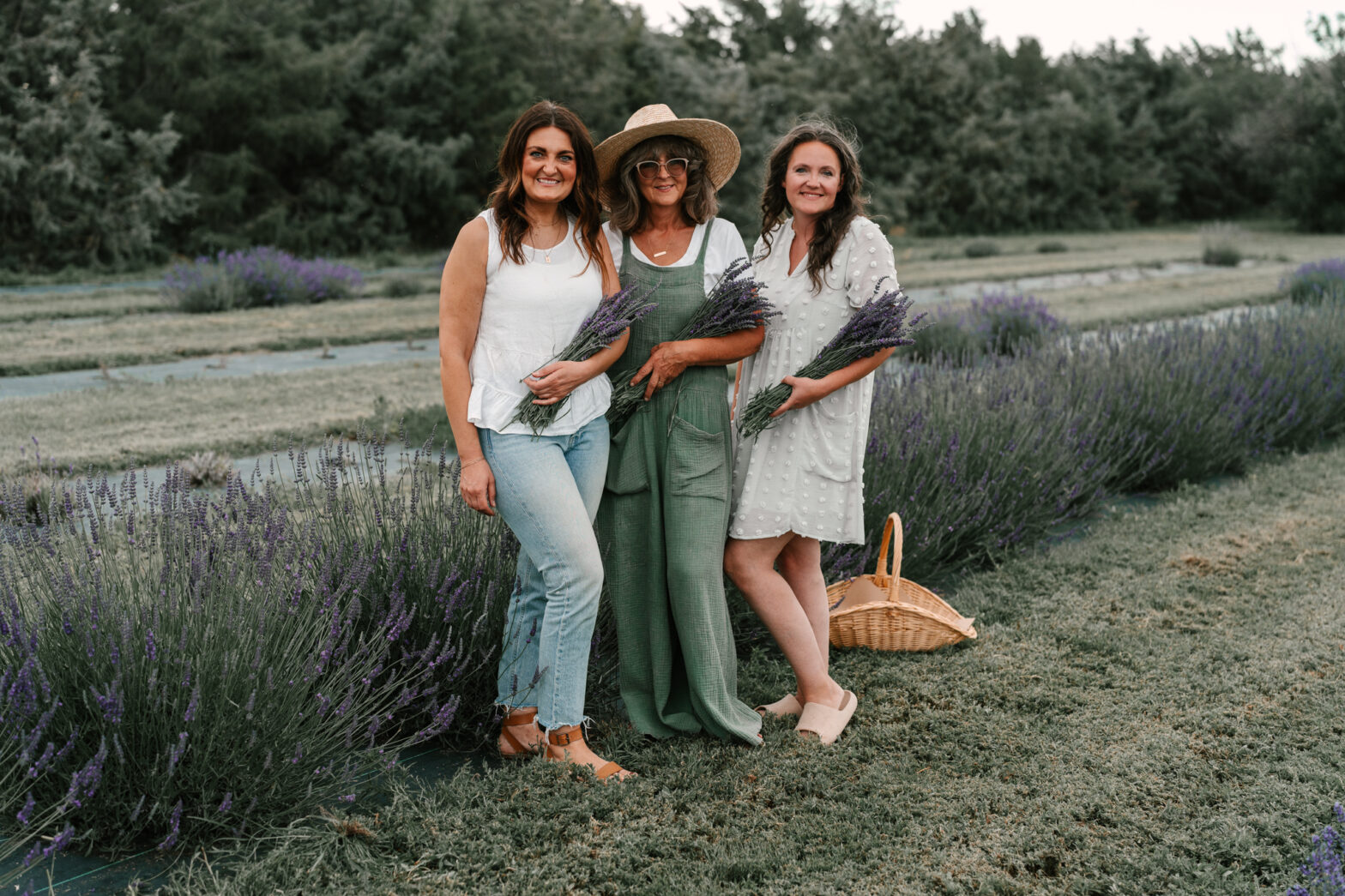 Our Lavender Co. Owners pose in field with Lavender